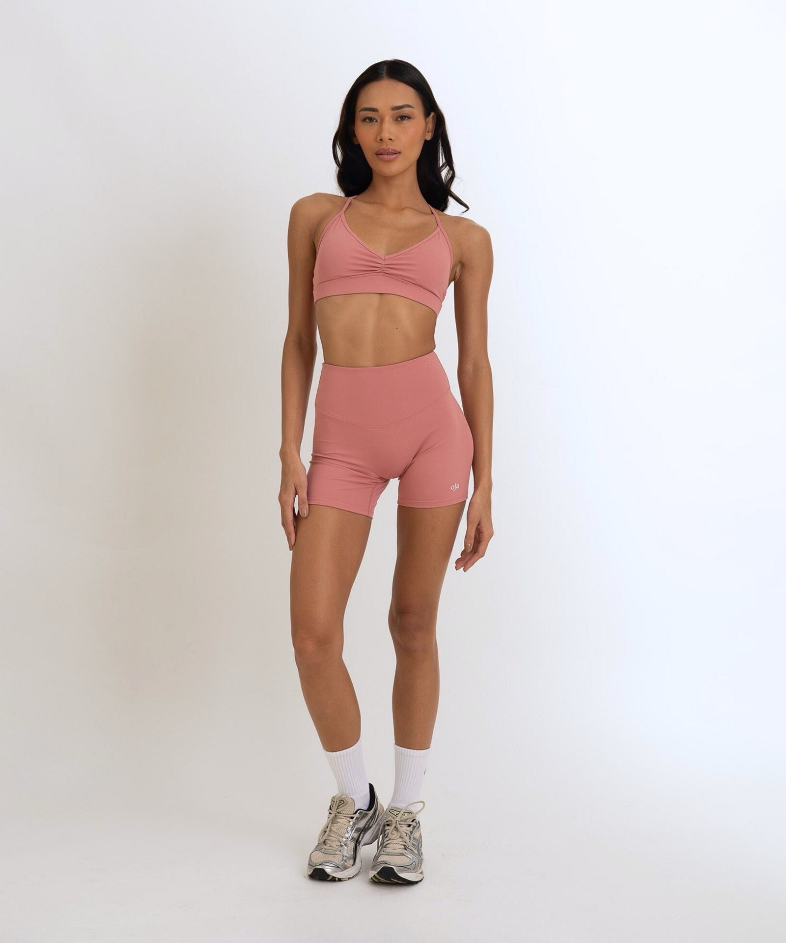 Front view of the Model Wearing a Dusty pink Color Ease Form Shorts From OJA Wear Philippines - Activewear & Athleisure for Pilates and Workouts