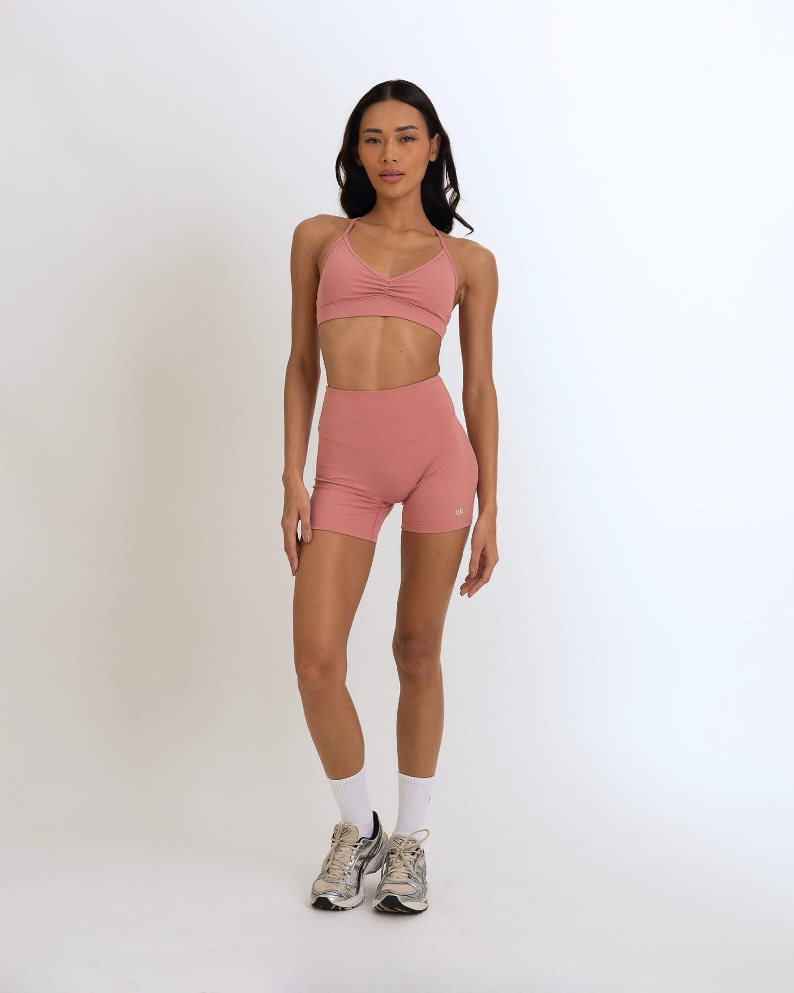 Front view of the Model Wearing a Dusty pink Color Ease Form Shorts From OJA Wear Philippines - Activewear & Athleisure for Pilates and Workouts