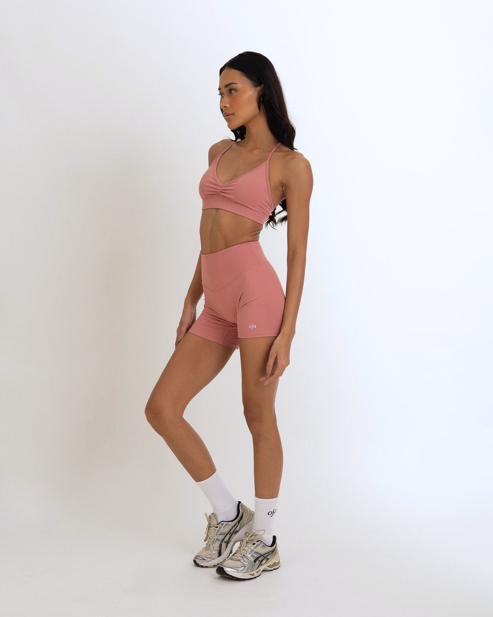 front view of the Model Wearing Dusty Pink Color Ease Form Shorts From OJA Wear Philippines - Activewear & Athleisure for Pilates and Workouts