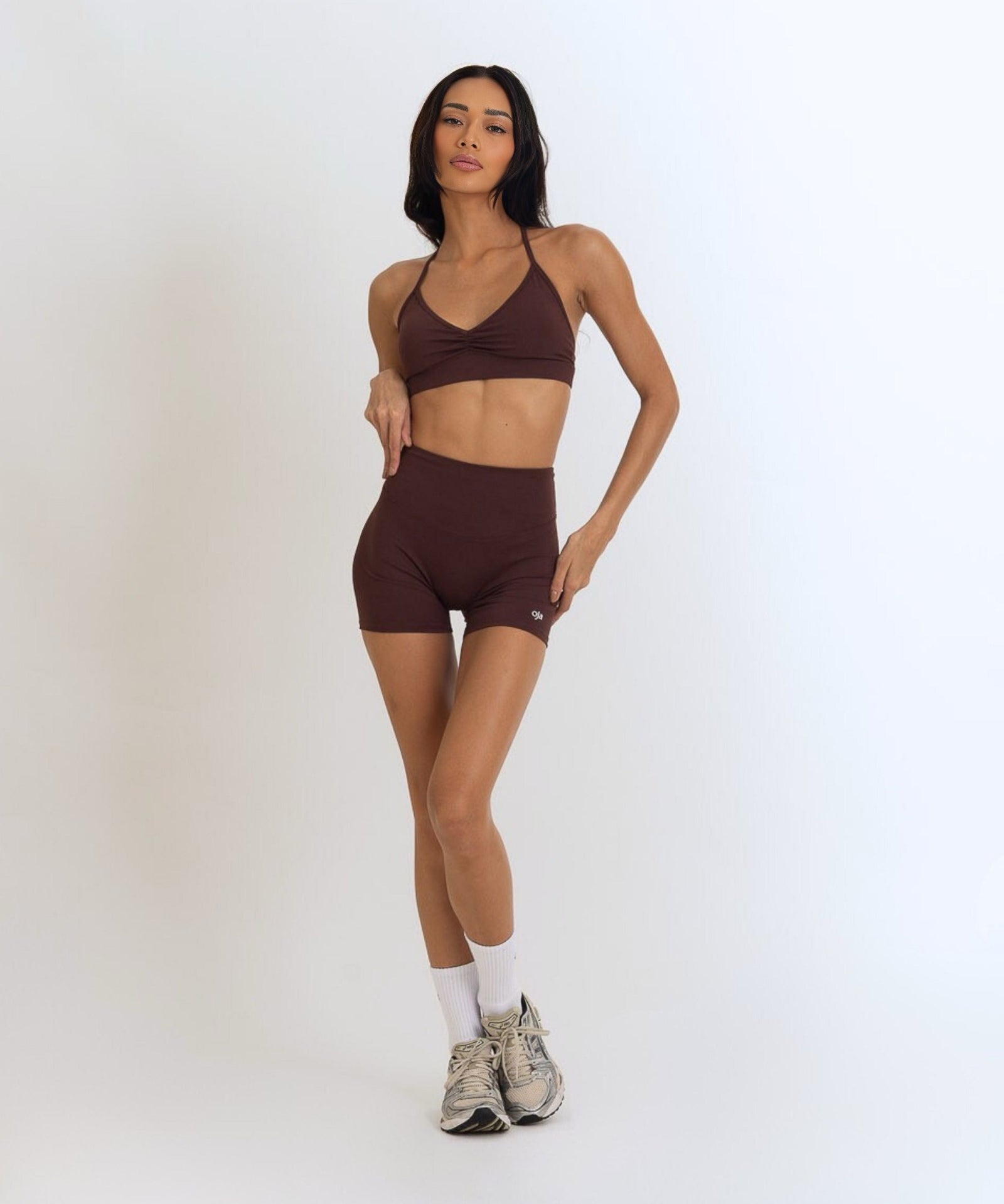 Front view of the Model Wearing a Espresso Color Ease Form Shorts From OJA Wear Philippines - Activewear & Athleisure for Pilates and Workouts
