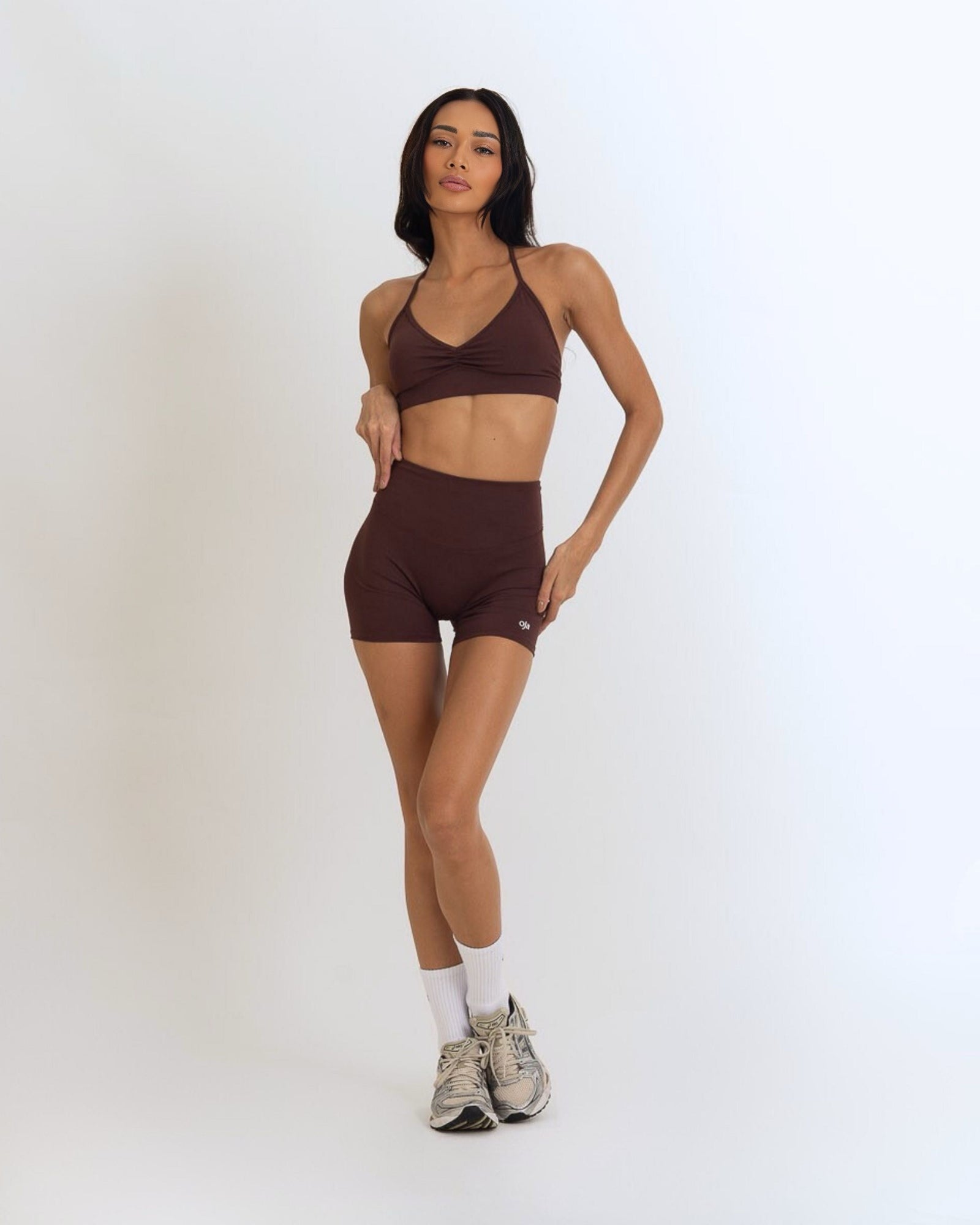 Front view of the Model Wearing a Espresso Color Ease Form Shorts From OJA Wear Philippines - Activewear &amp; Athleisure for Pilates and Workouts
