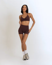 Front view of the Model Wearing a Espresso Color Ease Form Shorts From OJA Wear Philippines - Activewear & Athleisure for Pilates and Workouts