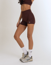 front view of the Model Wearing espresso Color Ease Form Shorts From OJA Wear Philippines - Activewear & Athleisure for Pilates and Workouts
