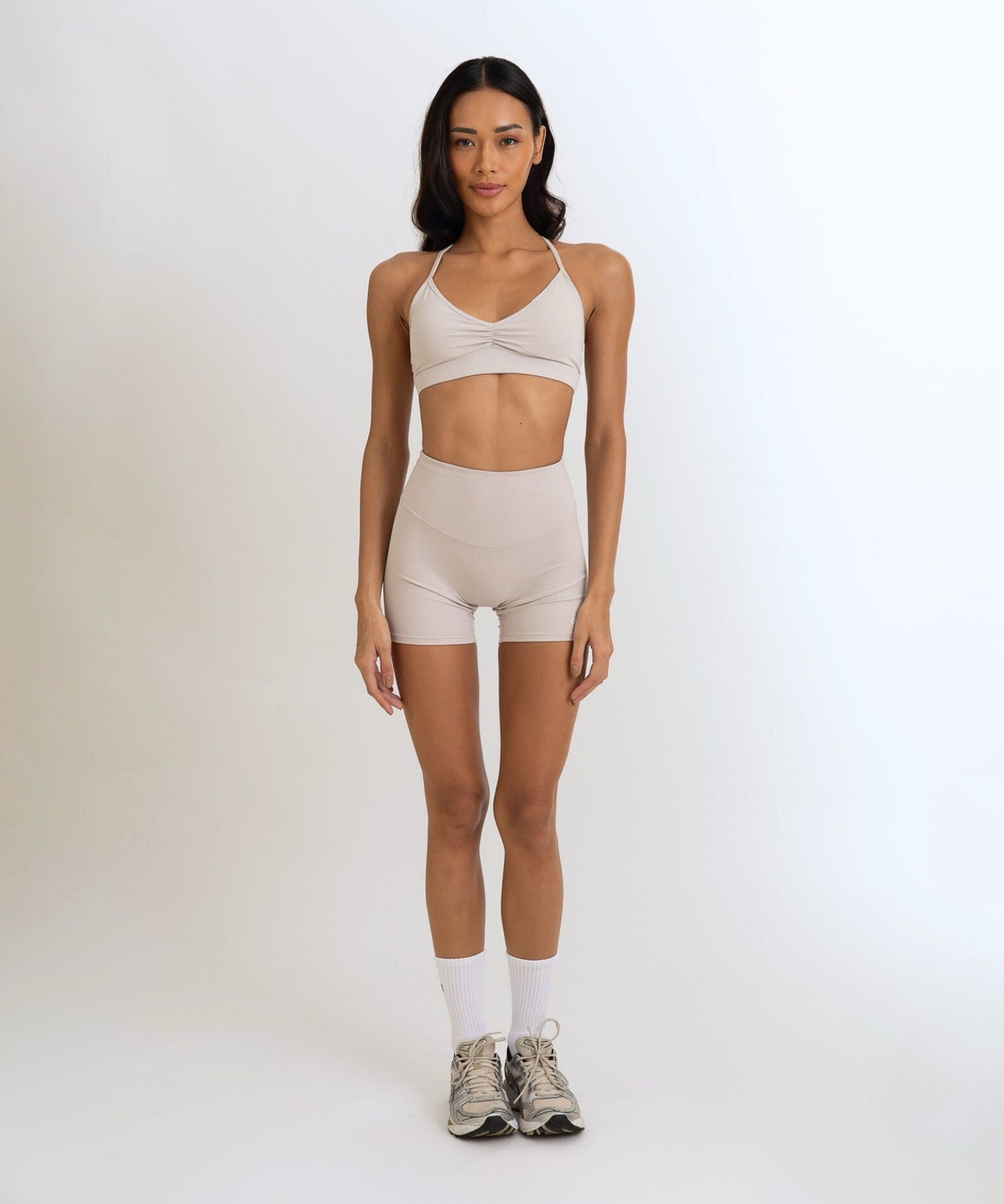Front view of the Model Wearing a Grey White Color Ease Form Shorts From OJA Wear Philippines - Activewear & Athleisure for Pilates and Workouts