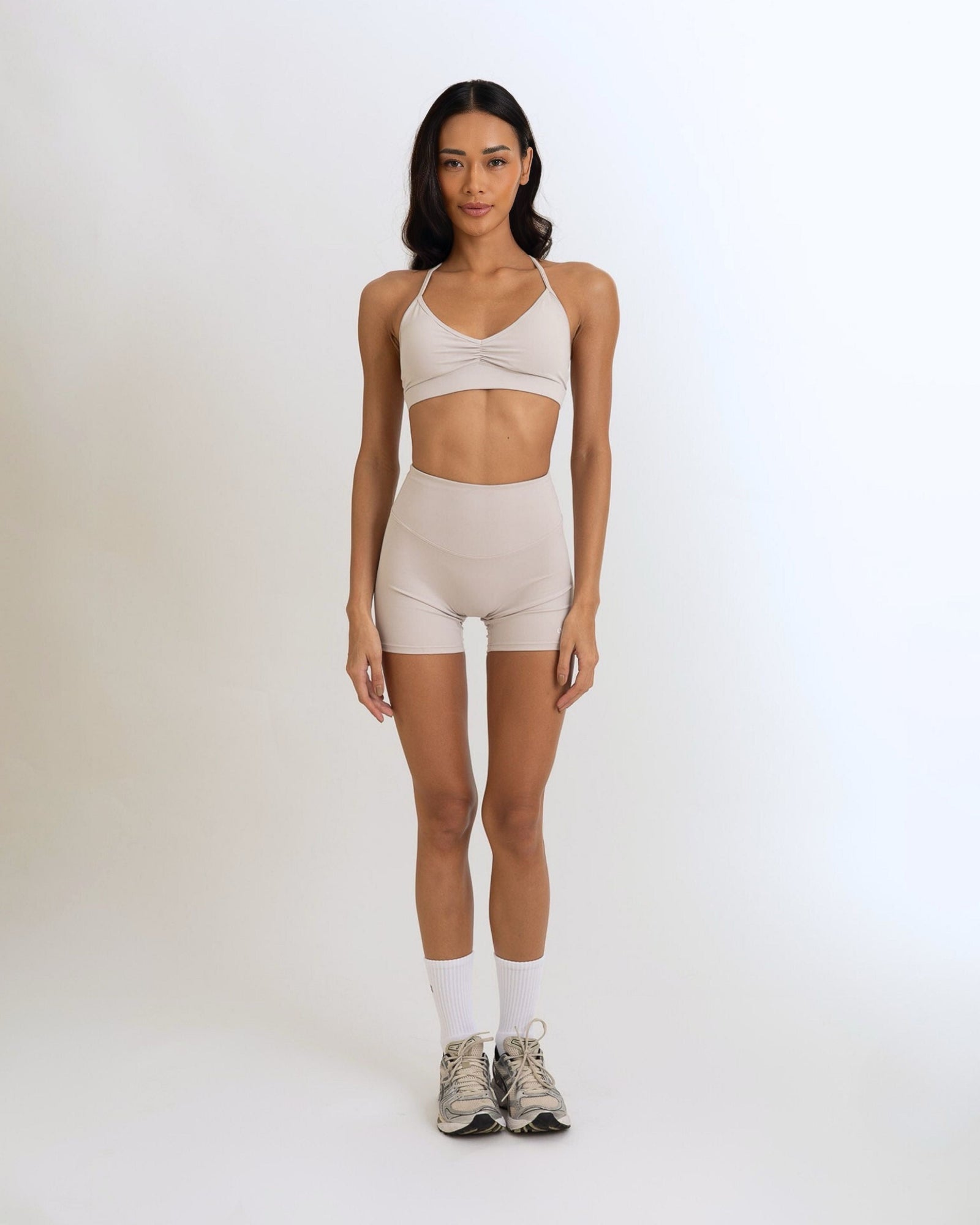 Front view of the Model Wearing a Grey White Color Ease Form Shorts From OJA Wear Philippines - Activewear & Athleisure for Pilates and Workouts